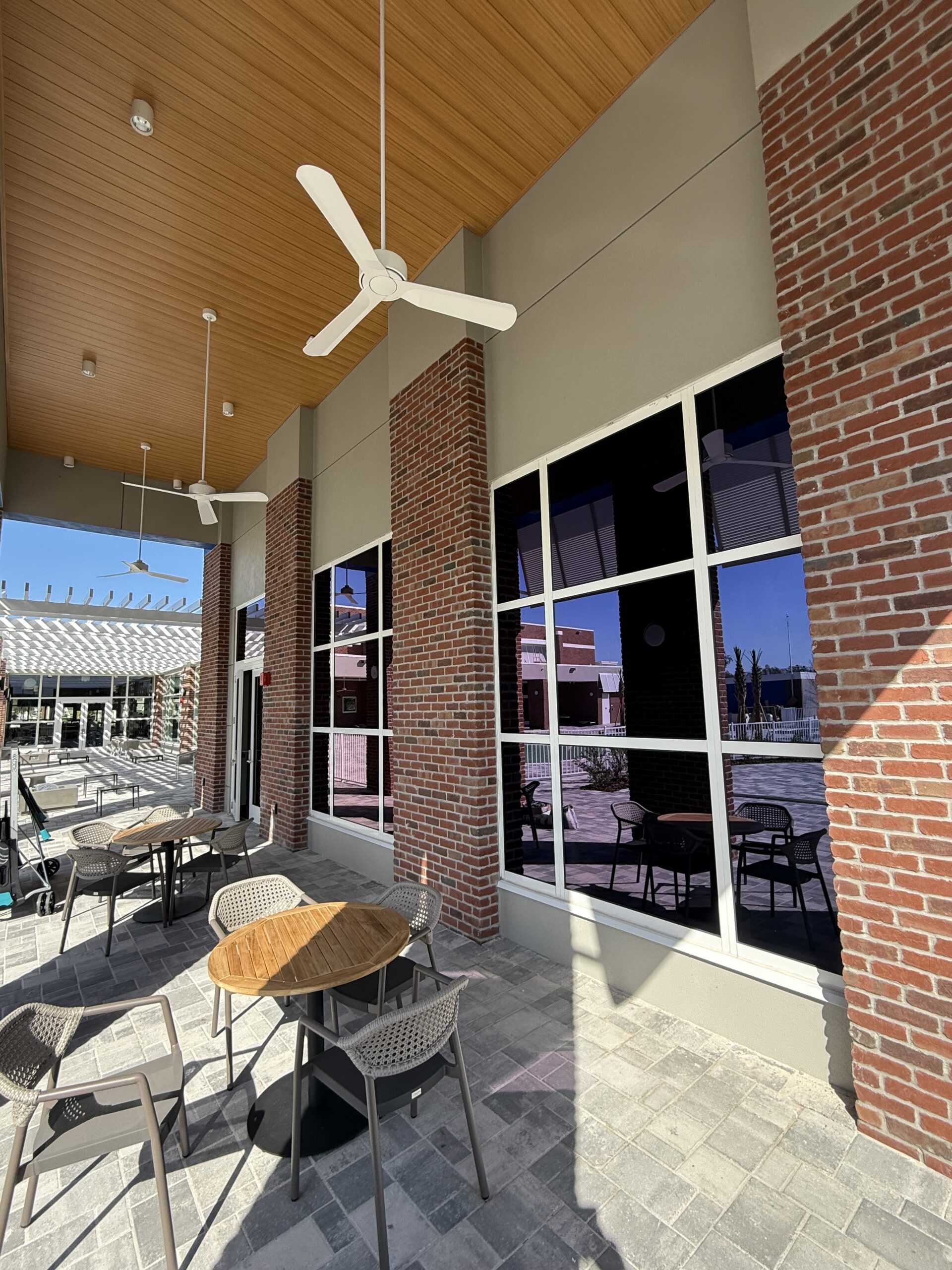 Privacy and glare reduction window tint for a community center